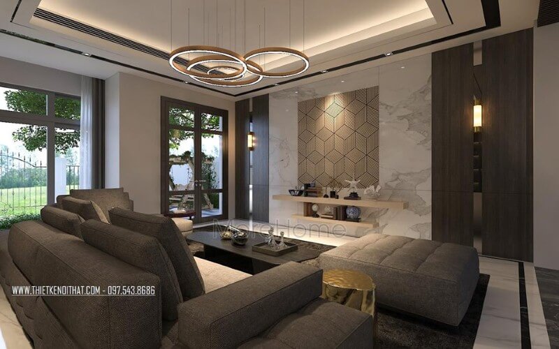 Sắp xếp không gian phòng khách rộng, hiện đại ấn tượng với ý tưởng sử dụng gam màu đối lập từ xám trắng cùng đồ nội thất cao cấp. Thiết kế nội thất phòng khách biệt thự