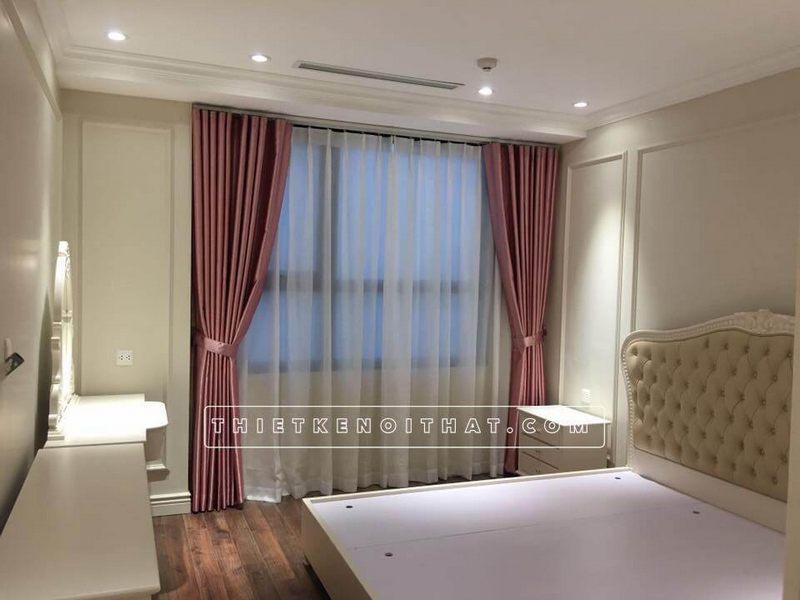 Không gian phòng ngủ mang nét đẹp thanh lịch và ngọt ngào với tông trắng hồng chủ đạo